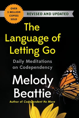 Paperback of The Language of Letting Go by Spiegel & Grau, featuring a simple cover design with the title and author.