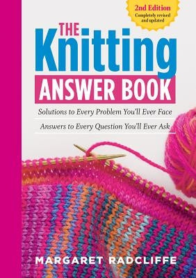 Paperback of The Knitting Answer Book, 2nd Edition by Storey Publishing, featuring a close-up of the book cover with knitting tools.