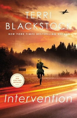 Paperback of Intervention: A Gripping Contemporary Christian Suspense Novel by Thomas Nelson, showing the book cover with title and design.