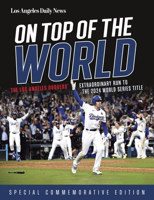 Paperback book titled "On Top of the World" about the Los Angeles Dodgers' 2024 World Series run, by Triumph Books.