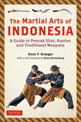 Paperback book titled "The Martial Arts of Indonesia" by Tuttle Publishing, featuring traditional Indonesian martial arts and weapons.