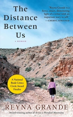 Paperback copy of "The Distance Between Us" by Washington Square Press, featuring the book's cover with title and author details.