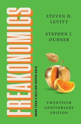 Paperback of Freakonomics Twentieth Anniversary Edition by William Morrow & Company, exploring the hidden side of economics.
