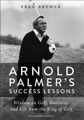 Paperback book titled "Arnold Palmer's Success Lessons" by Zondervan, featuring a cover with golf and life-themed imagery.