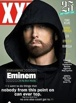 XXL Magazine featuring Eminem on the cover for the 25th anniversary edition, showcasing vibrant graphics and bold text.