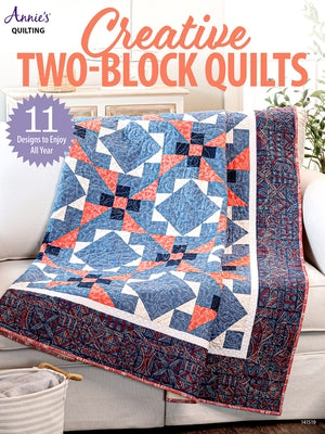 Paperback Creative Two-Block Quilts book by Annies featuring colorful quilt block designs and crafting instructions.