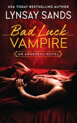 Paperback of Bad Luck Vampire by Avon Books, an Argeneau novel featuring a vampire character on the cover.