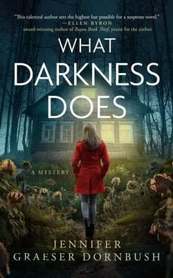 Paperback of "What Darkness Does" by Blackstone Publishing, featuring the book cover with dark and moody artwork.