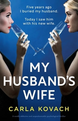 Paperback of "My Husband's Wife" psychological thriller by Bookouture, featuring the book cover with bold title and dark background.