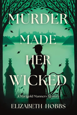 Paperback copy of "Murder Made Her Wicked," a Marigold Manners mystery by Crooked Lane Books, shown with cover art and title.