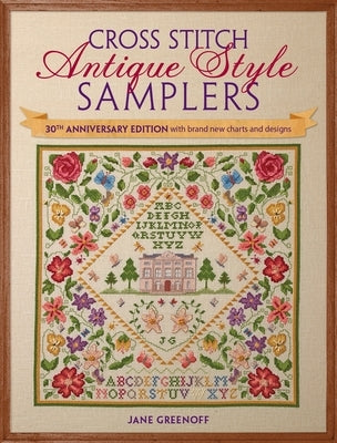 Paperback cross stitch sampler book by David & Charles, featuring antique-style designs and new charts for 30th anniversary edition.