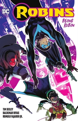 Paperback copy of "Robins: Being Robin" by DC Comics featuring Robin characters on the cover.
