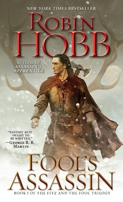 Mass market paperbound of Fool's Assassin by Del Rey Books, featuring a fantasy novel cover with dark and mysterious artwork.