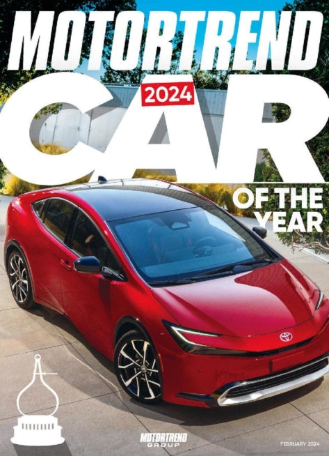 Motor Trend Magazine cover featuring automotive reviews and car news with vibrant graphics and bold headlines.