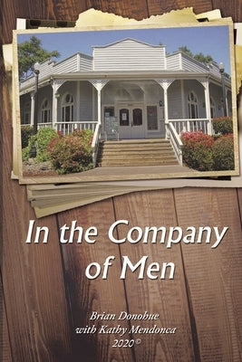 Paperback edition of "In the Company of Men" by ELM Hill, featuring the book cover with title and author name.