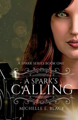 A paperback copy of "A Spark's Calling" by Fill Your Own Glass Publishing with a plain cover and title text.