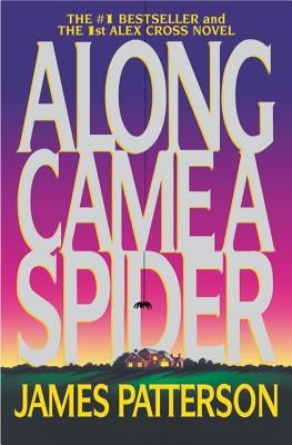 Paperback copy of "Along Came a Spider" by Grand Central Publishing, showing the book cover with title and author.