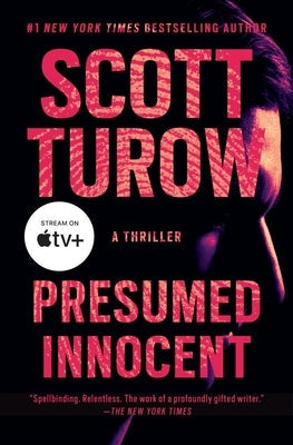 Paperback of "Presumed Innocent" by Grand Central Publishing, featuring the book cover with title and author details.