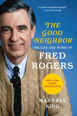 Paperback book titled "The Good Neighbor: The Life and Work of Fred Rogers" by Harry N. Abrams, featuring a colorful cover design.