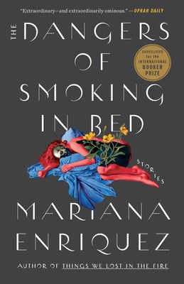 Paperback of "The Dangers of Smoking in Bed: Stories" by Hogarth Press, featuring the book cover with title and author details.