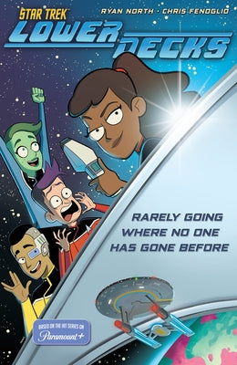 Paperback of Star Trek: Lower Decks comic book by IDW Publishing, featuring cover art with characters from the series.