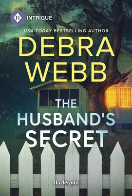 Mass market paperbound copy of The Husband's Secret by Harlequin Intrigue, featuring a mysterious novel cover with dark tones and bold title.