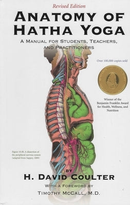 Paperback book titled "Anatomy of Hatha Yoga" by Body and Breath, showing detailed illustrations of yoga postures and anatomy.