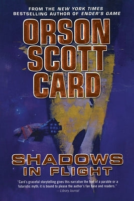 Paperback copy of Shadows in Flight by Tor Books, featuring the book cover with dark and atmospheric artwork.