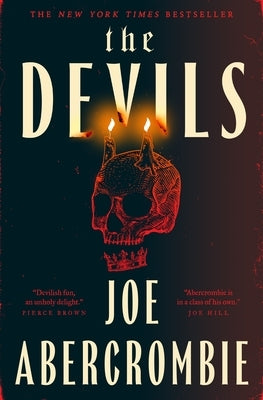 Paperback of "The Devils" by Tor Books showing the book cover with dark artwork and bold title text.