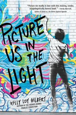 Paperback of "Picture Us in the Light" by Little, Brown Books for Young Readers, showing the book cover with colorful artwork.