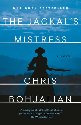Paperback of The Jackal's Mistress novel by Vintage, showing the book cover with dark, mysterious artwork.