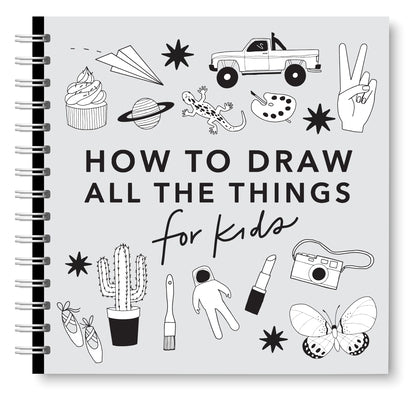 Paperback "All the Things" drawing book for kids with colorful illustrations of cars, unicorns, dragons, cupcakes, and more by Paige Tate & Co.