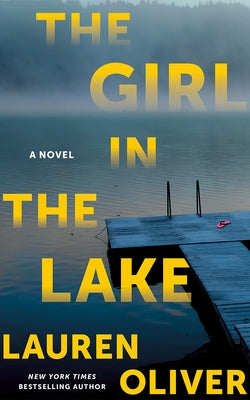 Paperback of The Girl in the Lake by Thomas & Mercer, showing the book cover with lake and forest imagery.