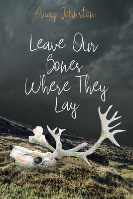 Paperback of "Leave Our Bones Where They Lay" by Inhabit Media, featuring a cover with bones and nature scene.