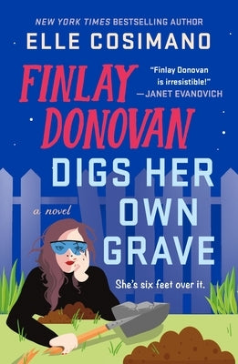 Paperback of "Finlay Donovan Digs Her Own Grave" by Minotaur Books, featuring the book cover with title and author text.