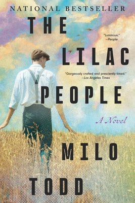 Paperback book titled "The Lilac People" by Counterpoint LLC, featuring a colorful cover with floral and purple tones.