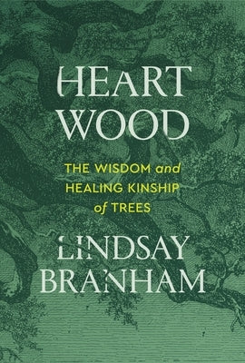 Paperback copy of "Heartwood: The Wisdom and Healing Kinship of Trees" by Balance, showing the book cover with tree imagery.