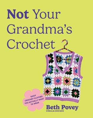 Open paperback of "Not Your Grandma's Crochet" by Blue Star Press showing colorful crochet clothing patterns on the cover.