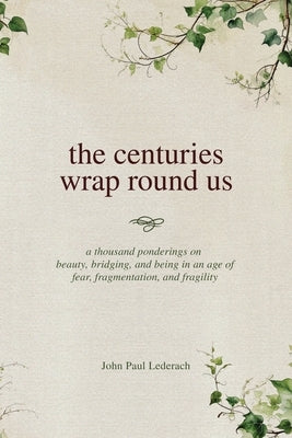 Paperback of "The Centuries Wrap Round Us" by Outskirts Press, showing the book cover with artistic design and title text.