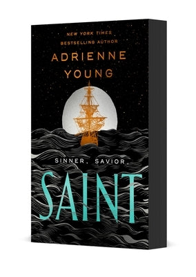 Paperback copy of the novel "Saint" by Wednesday Books, showing the front cover with bold title and artistic design.