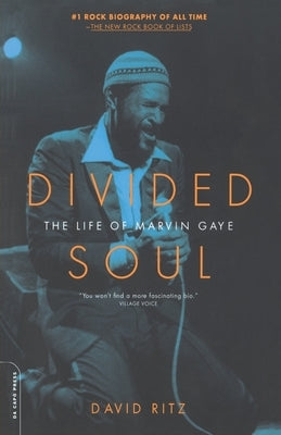 Paperback book titled "Divided Soul: The Life of Marvin Gaye" by Da Capo, showing the cover with Marvin Gaye's portrait.