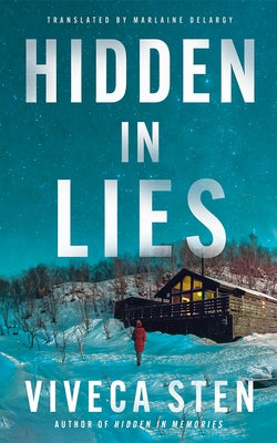 Paperback of Hidden in Lies by Amazon Crossing, featuring the book cover with dark and mysterious design elements.