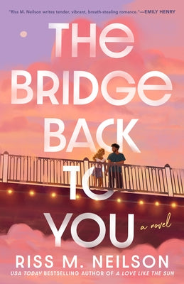 Paperback of "The Bridge Back to You" by Berkley Books, showing the book cover with title and author details.