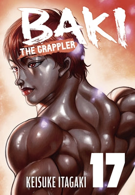 Paperback copy of Baki the Grappler Perfect Edition Vol. 17 by Kodama, featuring cover art with dynamic manga illustrations.