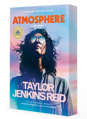 Paperback of "Atmosphere: A GMA Book Club Pick" by Ballantine Books, showing the book cover with title and author details.