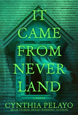 Paperback of "It Came from Neverland" by Crooked Lane Books, featuring the book cover with dark and whimsical artwork.