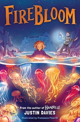 Paperback copy of Firebloom by Kelpies featuring the book cover with vibrant artwork and title text.
