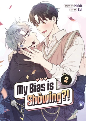 Paperback of "My Bias Is Showing?! Vol. 2" manga by Seven Seas, featuring colorful cover art with characters on the front.