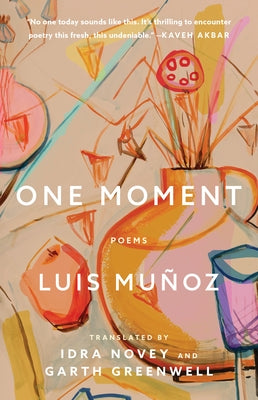 Paperback of "One Moment: Poems" by Washington Square Press, featuring a close-up of the book cover with poetic artwork.
