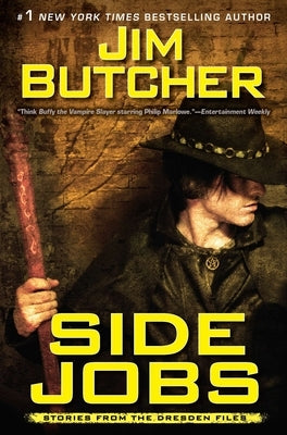 Paperback copy of "Side Jobs" by Ace Books, featuring the book cover with title and author details visible.